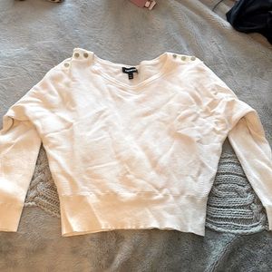 White sweater with gold buttons on shoulders